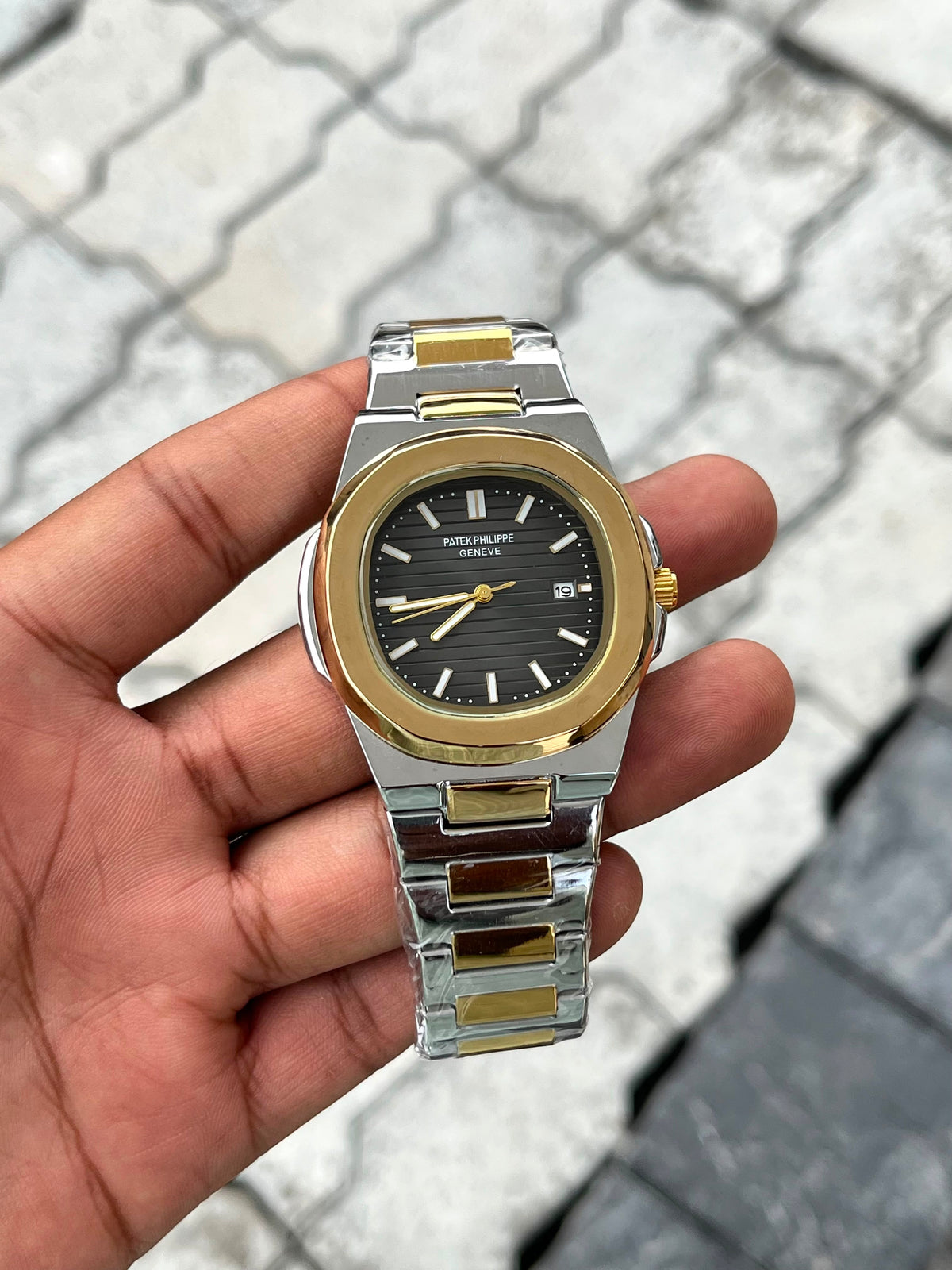 Patek Philippe Black Dial Two-Tone Gold Stainless Steel Nautilus Watch